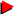 red floating triangle